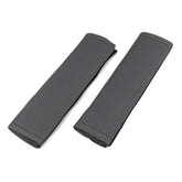 Cuscinetti per cintura di sicurezza color carbonio, set da 2 pezzi.