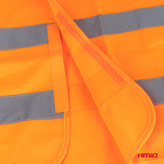 Dettaglio delle bande riflettenti sul gilet catarifrangente arancione
